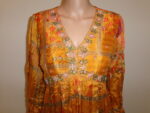 Saffron Radiance: Handcrafted Heritage Gown